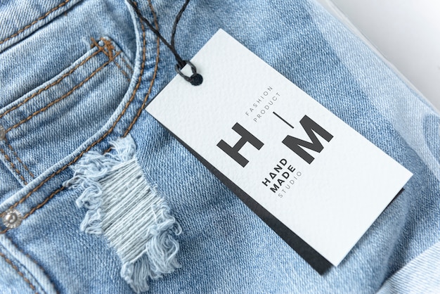 Ripped jean shorts with a tag mockup