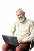 Free PSD senior man using laptop