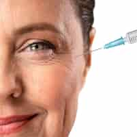 Free PSD senior woman with syringe for skin