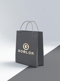 골드 컬러 로고가 있는 쇼핑백 모형