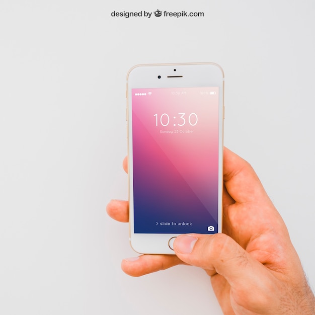 PSD gratuito smartphone mockup con la mano