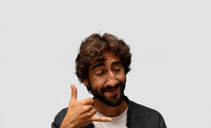 Free PSD smiling cheerfully and pointing to camera while making a call you later gesture talking on phone