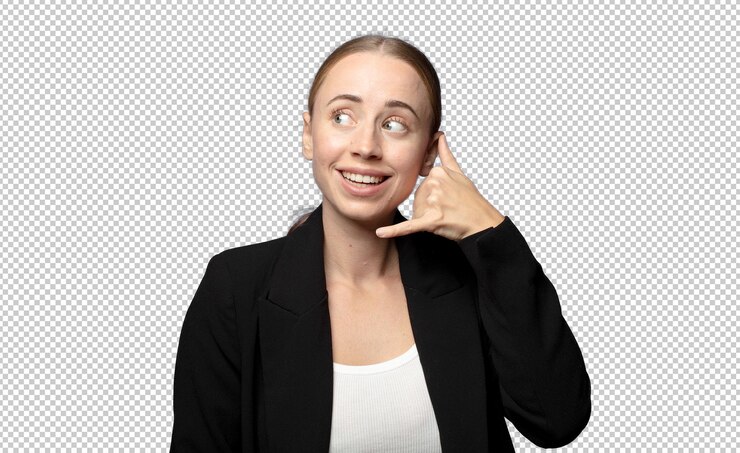 Free PSD smiling cheerfully and pointing to camera while making a call you later gesture talking on phone