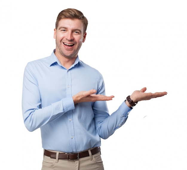 Smiling employee showing open palm hand gesture