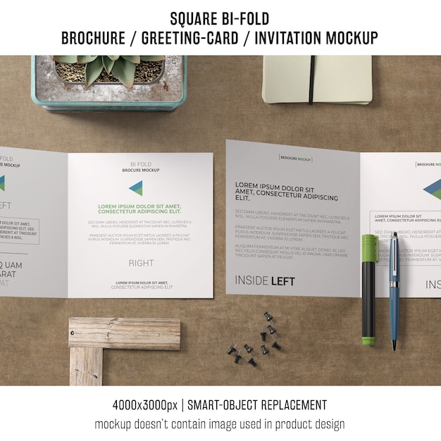 Free PSD square bi-fold brochure or greeting card mockup in top view