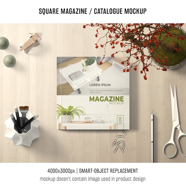 Free PSD square magazine or catalogue mockup with creative still life