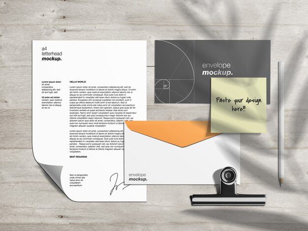 Download Premium Psd Stationery Branding Identity Mockup Template And Scene Creator With Letterhead Envelopes And Sticky Note On Wooden Table