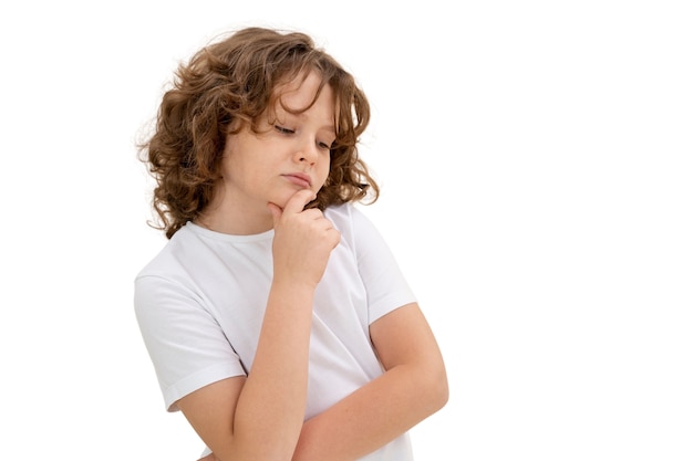 Studio portrait of adorable young boy