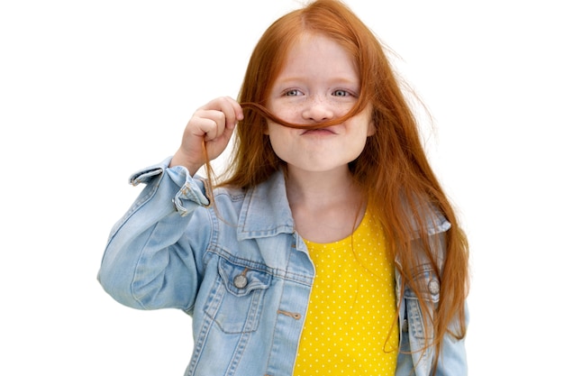 Studio portrait of adorable young girl