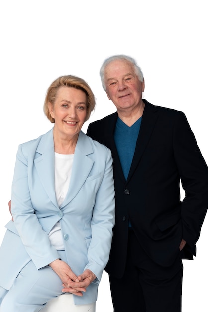 Studio portrait of loving elderly couple