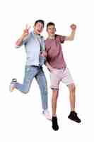 Free PSD studio portrait of two teenage friends jumping