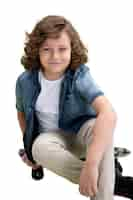 Free PSD studio portrait of young boy with skateboard