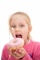 Free PSD studio portrait of young girl with birthday donut