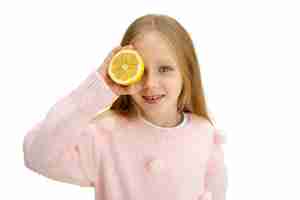 Free PSD studio portrait of young girl with lemon