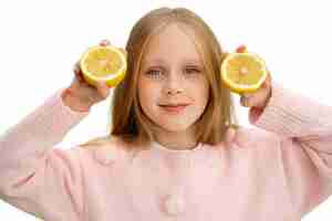 Free PSD studio portrait of young girl with lemons