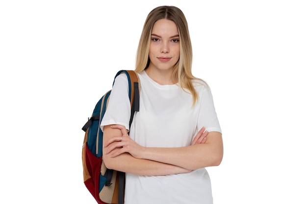 Studio portrait of young teenage student girl with backpack