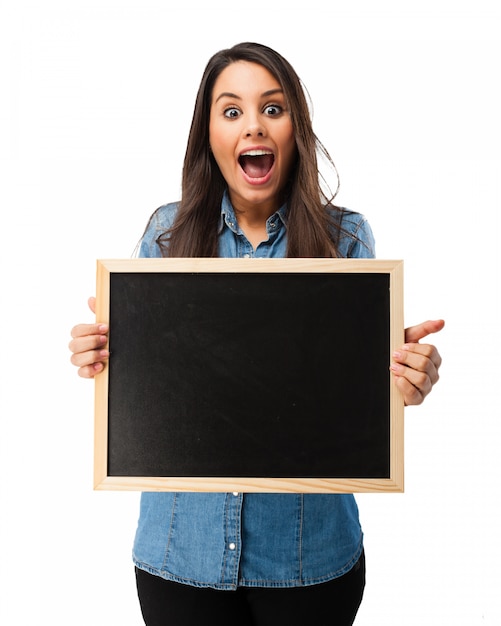 Surprised student with a blackboard