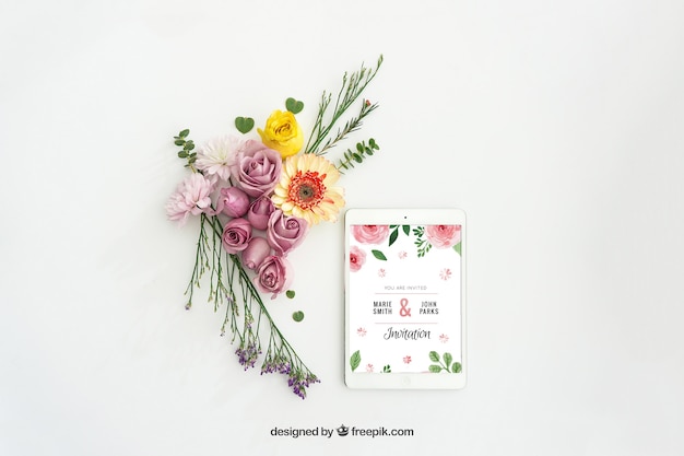 Tablet mockup design with floral decoration