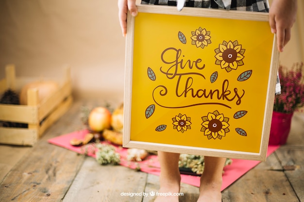 Thanksgiving mockup with girl holding frame