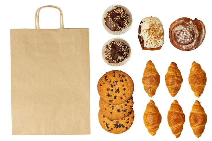 Free PSD top view delicious baked products still life