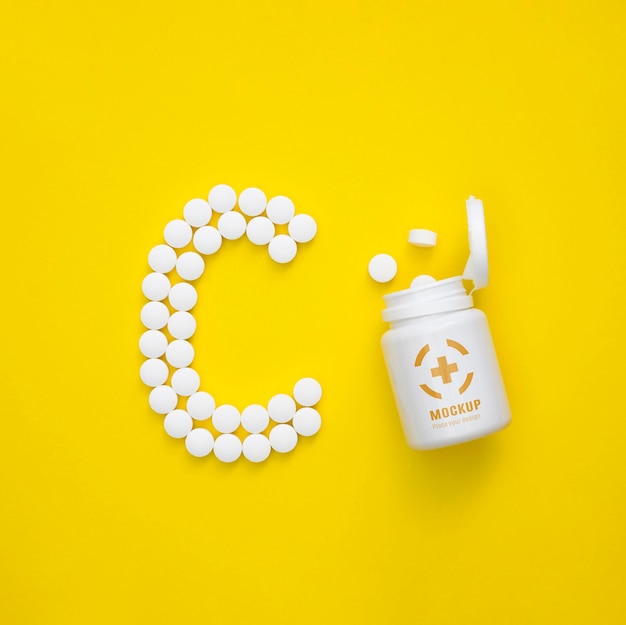C​の​形​の​丸薬​と​ボトル​の​上面図