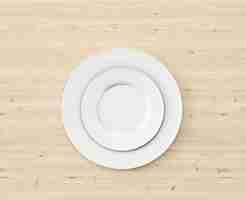 Free PSD top view white plate on wooden table