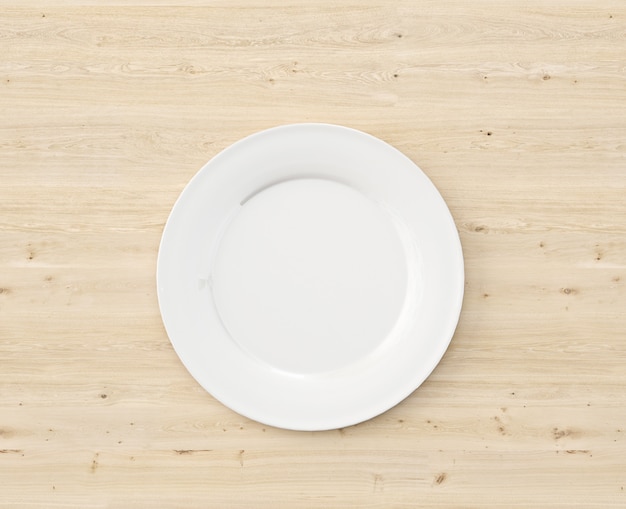 top view white plate on wooden table