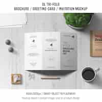 Free PSD trifold brochure or invitation mockup with still life concept