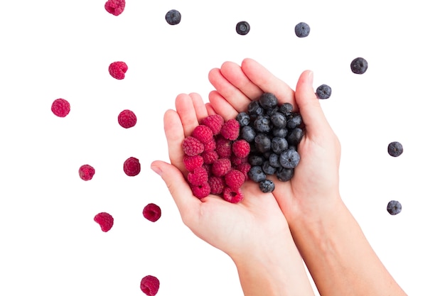 Free PSD view of hands holding fresh berries