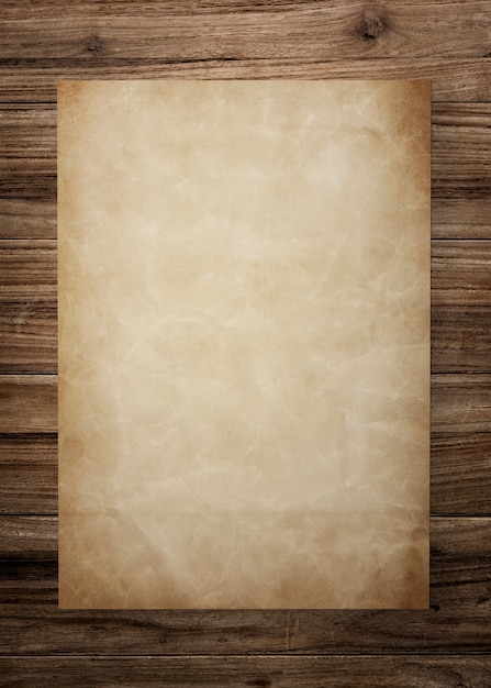 Vintage paper mockup on wooden background