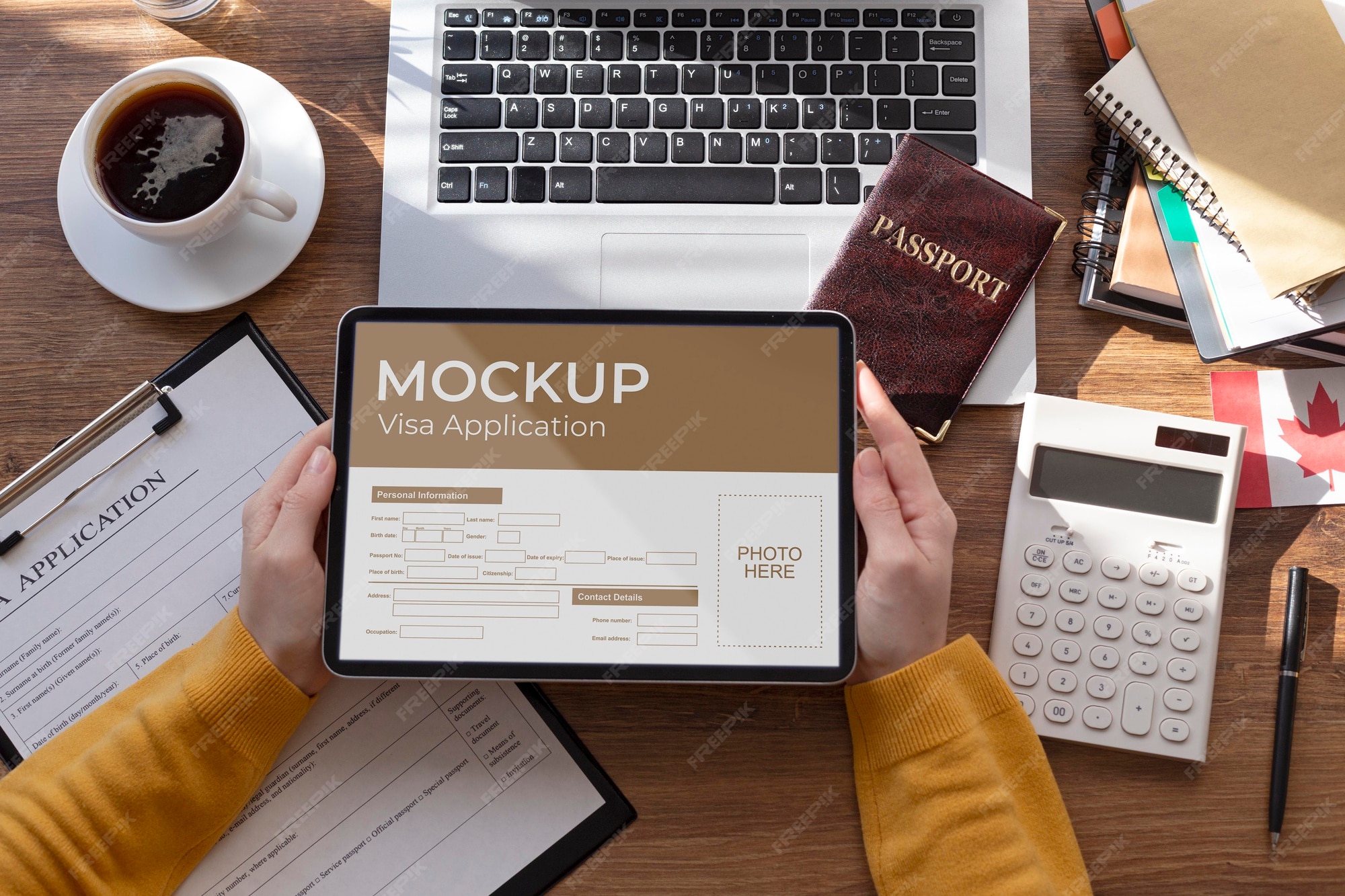 visa application mock up tablet holded by human hands desk with passport laptop documents 23 2149149410