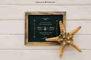 Free PSD wedding mock up with blackboard and starfish