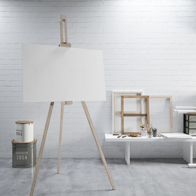 Free PSD white canvas on a easel at the art room