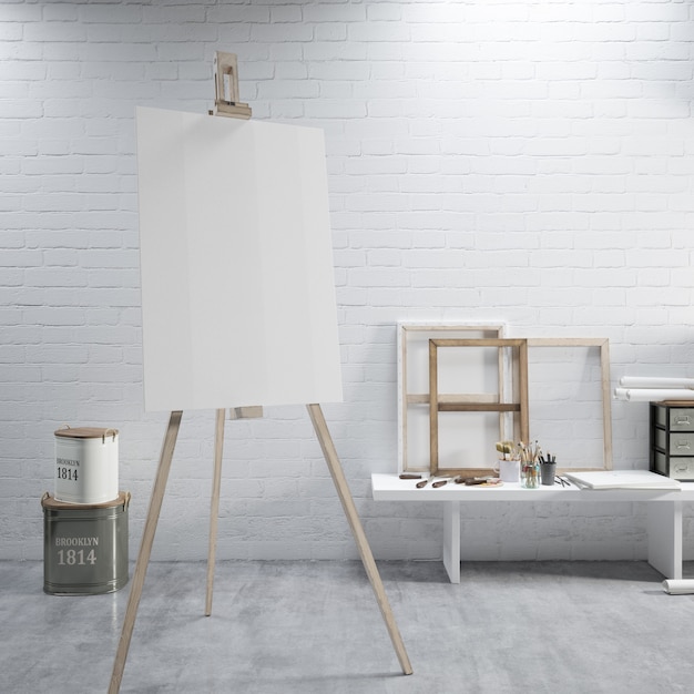 Free PSD white canvas on a easel at the art room