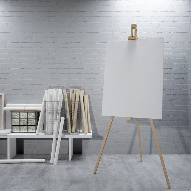 Free PSD white canvas on a easel at the art room