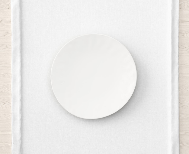 White plate on tablecloth