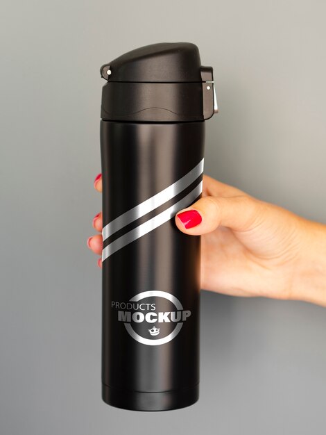 Download Free Psd Woman Holding A Black Thermos Mock Up