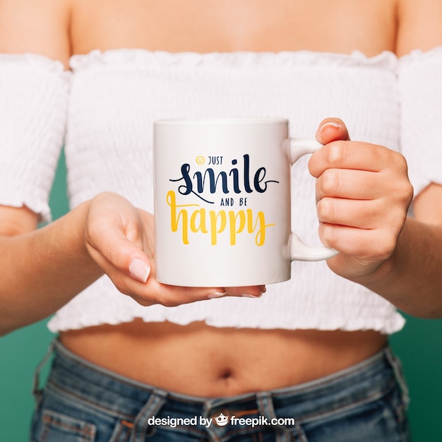 Free Woman Holding Coffee Mug Mockup PSD Template