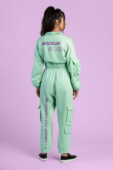 Woman wearing jogger pants and hoodie mockup