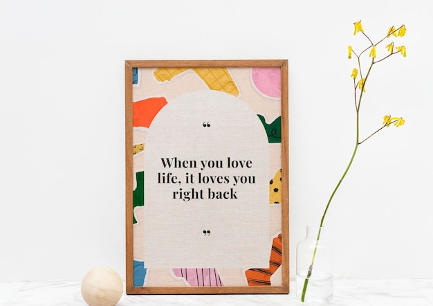 Free PSD wooden picture frame mockup psd with motivational quote on ripped paper collage background