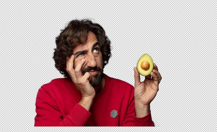 मुफ़्त PSD young adult bearded man with an avocado