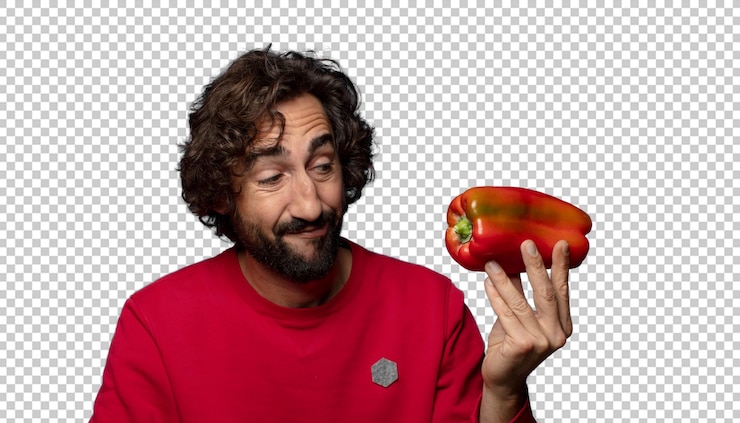 Free PSD young adult bearded man with a red pepper