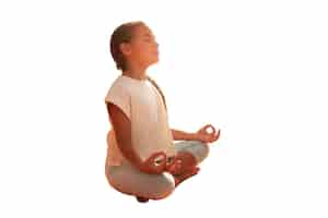 Free PSD young girl doing yoga and meditation