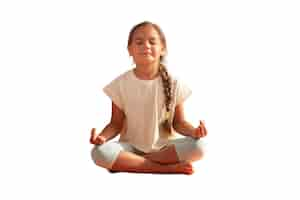 Free PSD young girl doing yoga and meditation