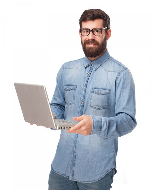  young man holding his laptop