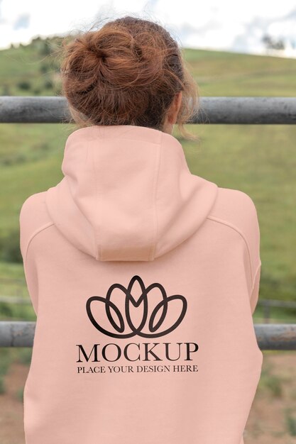 Young woman wearing a mock-up hoodie