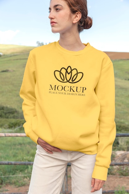 Young woman wearing a mock-up hoodie