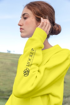 Young woman wearing a mock-up hoodie