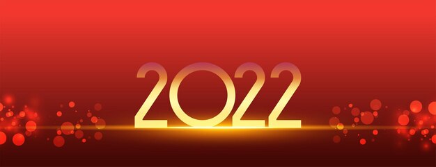 2022年の輝くテキストボケ赤のライトが付いた光沢のある金色のバナー