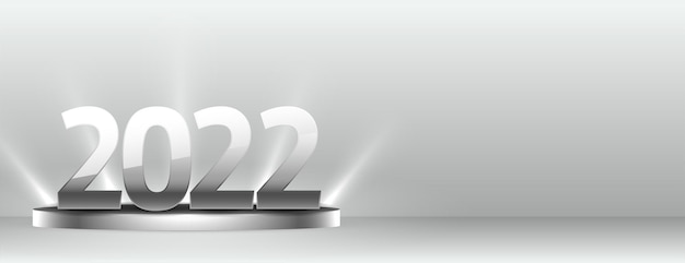 Free vector 2022 text on silver podium with studio background and light effect